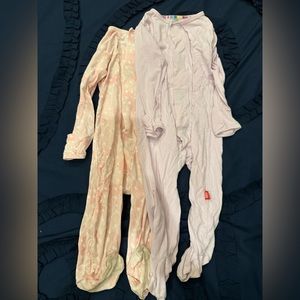 Magnetic Me 3-6 months. Used. Feet on pink/white one are stained from a walker.